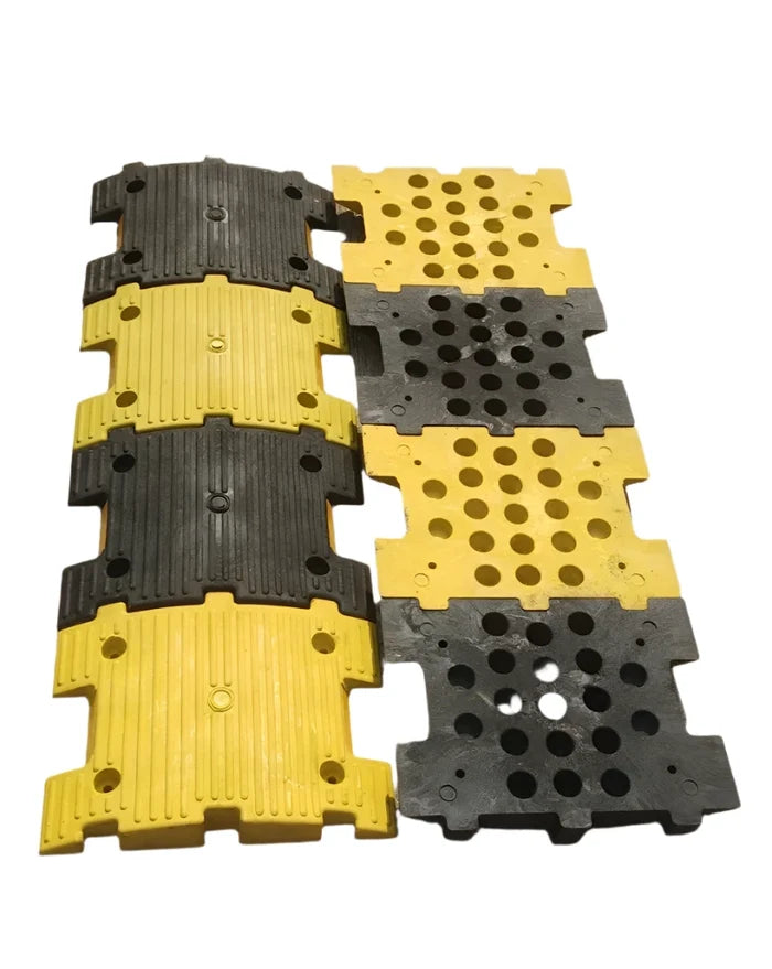 MIXTURE OF RUBBER & PLASTIC SPEED BREAKER SIZE: 350W X 250L X 50H MM (YELLOW/BLACK COLOR)WITH REFLECTIVE CAT EYES