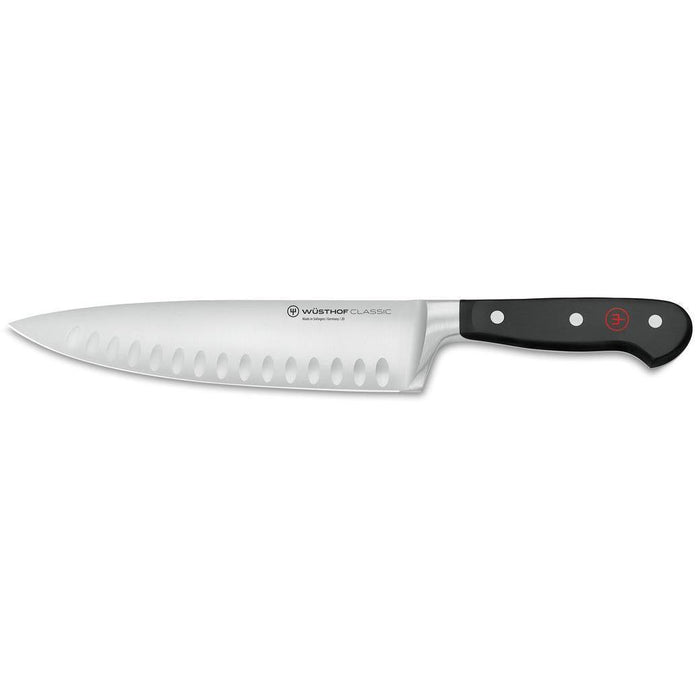Wusthof Classic Demi-Bolster Cook's Knife Hollow Edge (8″) displayed horizontally on a white background