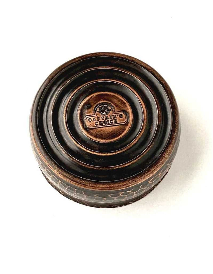 Bottom view of copper shave bowl with Captain's Choice logo