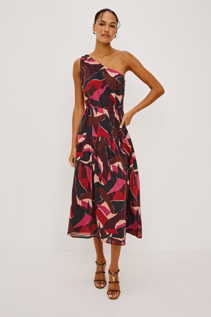 Cecilie Midi Dress in Cotton Voile With One-Shoulder Neckline, Adjustable Waist Ties With Beaded Tassels, Dropwaist Tier Detail, Fully Lined, and Side Zipper Closure in Paradise Colorway - Full Body Front View Featured on Model
