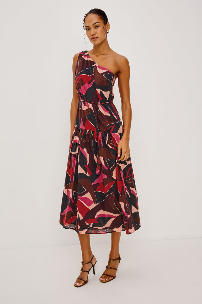 Cecilie Midi Dress in Cotton Voile With One-Shoulder Neckline, Adjustable Waist Ties With Beaded Tassels, Dropwaist Tier Detail, Fully Lined, and Side Zipper Closure in Paradise Colorway - Full Body Front View Featured on Model