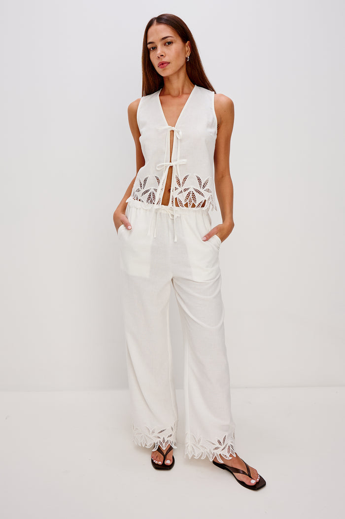 Emmie Straight Leg Pant with Adjustable Drawstring at Waist in White Palm Embroidery Colorway. Full Body Front View Shown on Model.