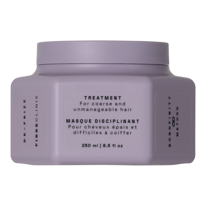 Fibre Clinix hair treatment in a purple jar with text on a white background