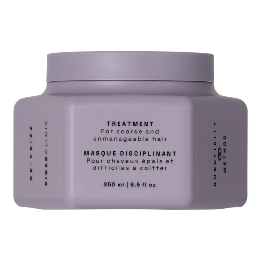 Fibre Clinix hair treatment in a purple jar with text on a white background