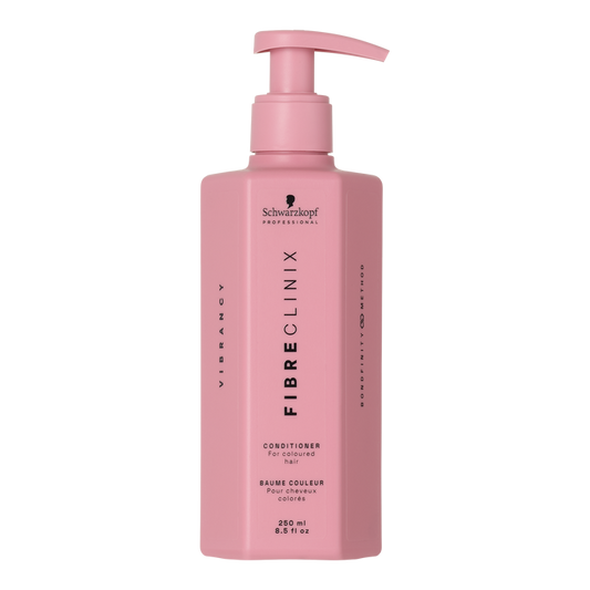Fibre Clinix Vibrancy Conditioner in a light pink pump bottle on a white background