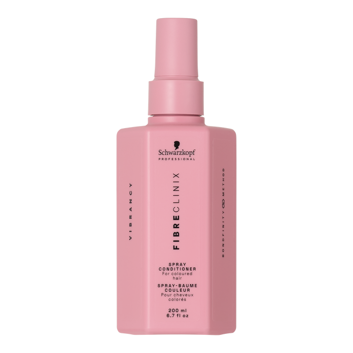 Fibre Clinix Vibrancy spray leave in conditioner in a light pink bottle on a white background
