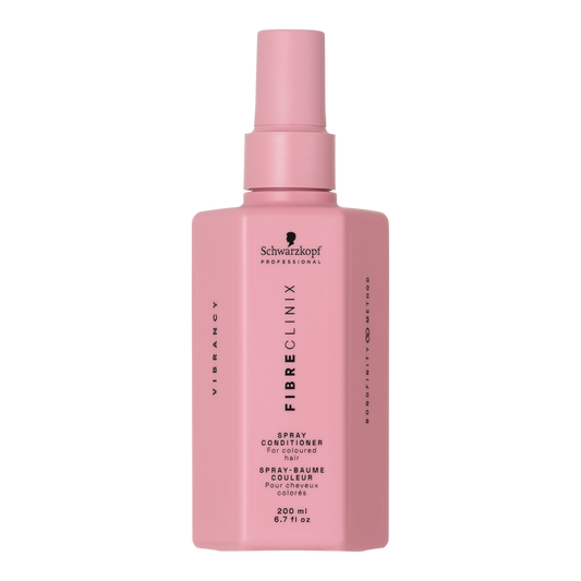 Fibre Clinix Vibrancy spray leave in conditioner in a light pink bottle on a white background