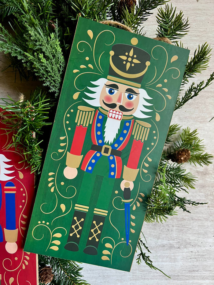 GREEN NUTCRACKER WITH SWORD SIGN