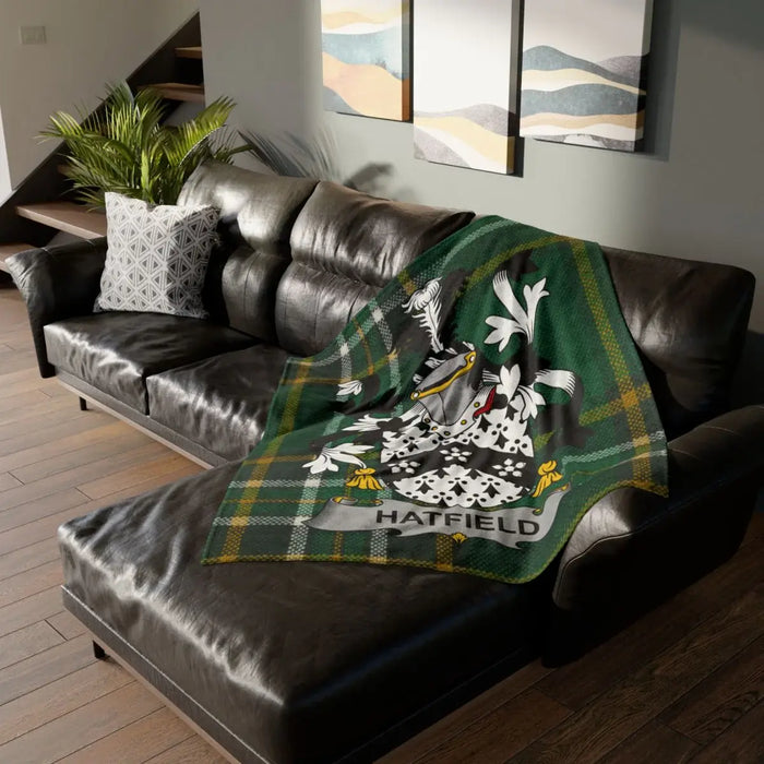 Hatfield Family Crest Design on Green Tartan Blanket