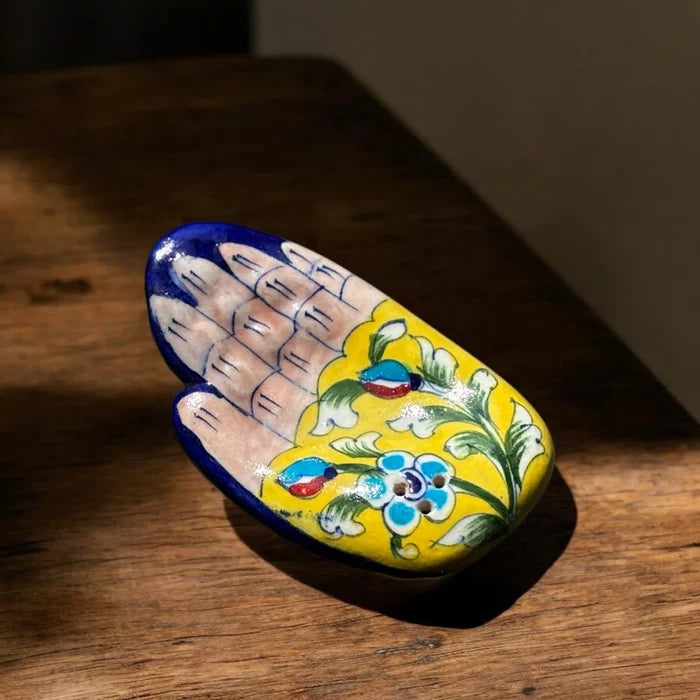 Floral ceramic hand-shaped incense stick holder by Pure Elements NIIRA, decorative agarbatti stand