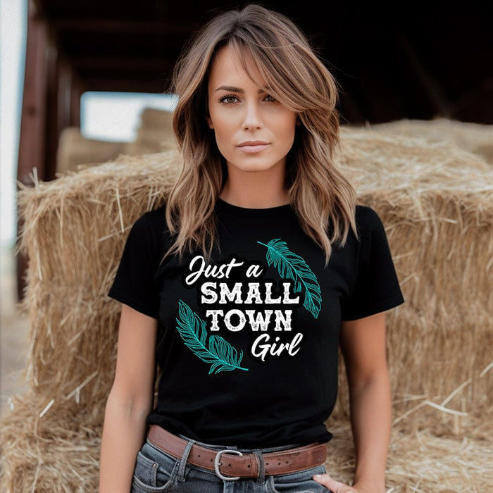 Woman in Just a Small Town Girl tee