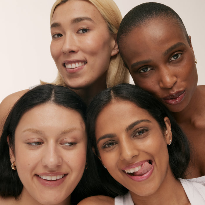 Models with tinted Tripepeptide Lip Balm