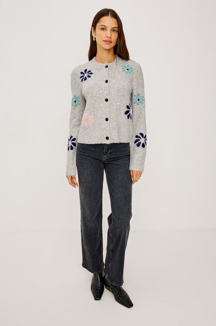 Millie Cardigan in Wool Blend With Contrast Floral Motif Pattern, Crew Neckline, Front Buttons, Ribbed Trim, and Long Sleeves in Grey Multi Colorway - Full Body Front View Featured on Model