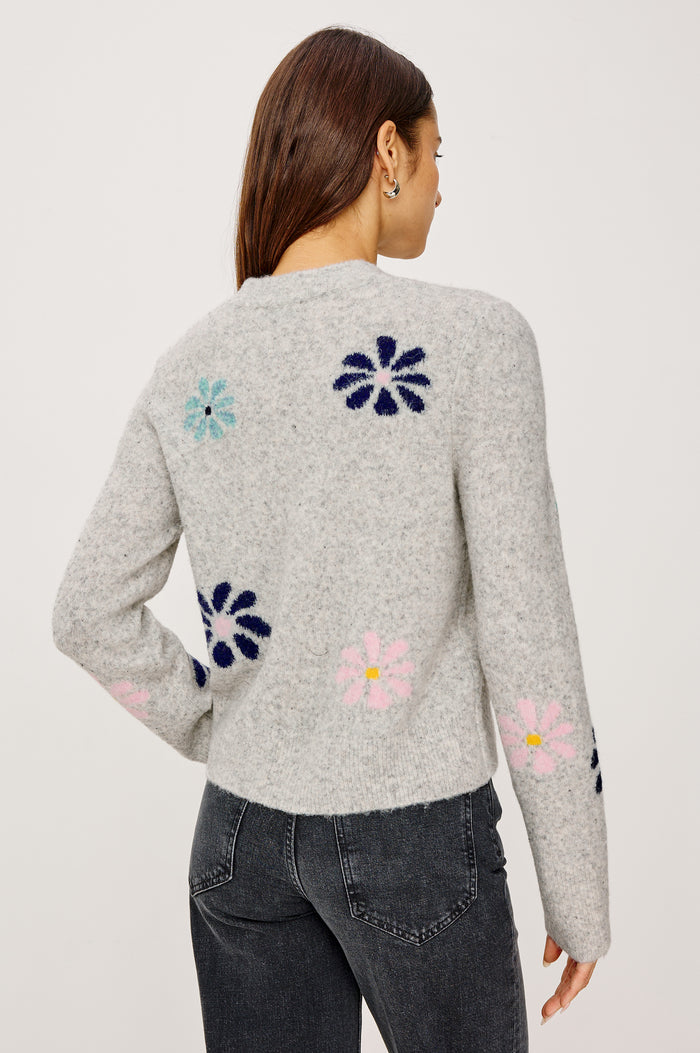 Millie Cardigan in Wool Blend With Contrast Floral Motif Pattern, Crew Neckline, Front Buttons, Ribbed Trim, and Long Sleeves in Grey Multi Colorway - Upper Body Back View Featured on Model