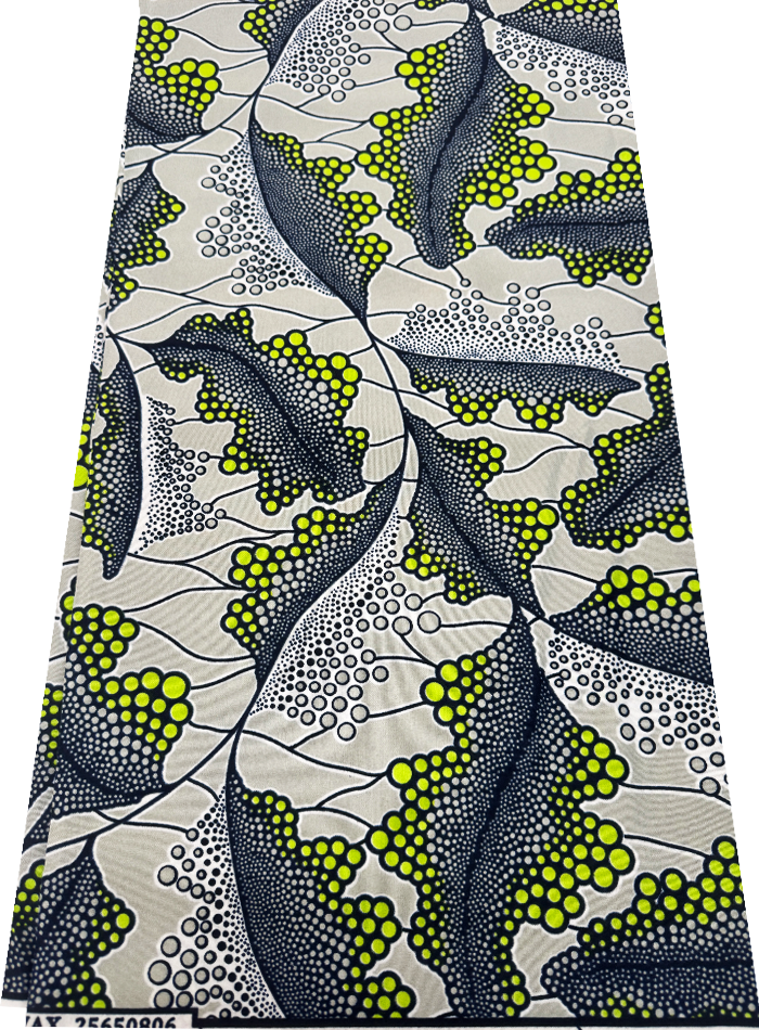 African Fabric with a leaf pattern in green, gray, and black on a white background