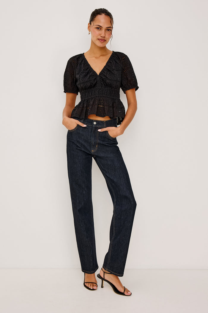 Topanga High-Rise Wide Straight Leg Jean in Dark Wash Denim With 5-Pockets and a Front Zip-Fly in Midnight Blues Colorway - Front View Featured on Model