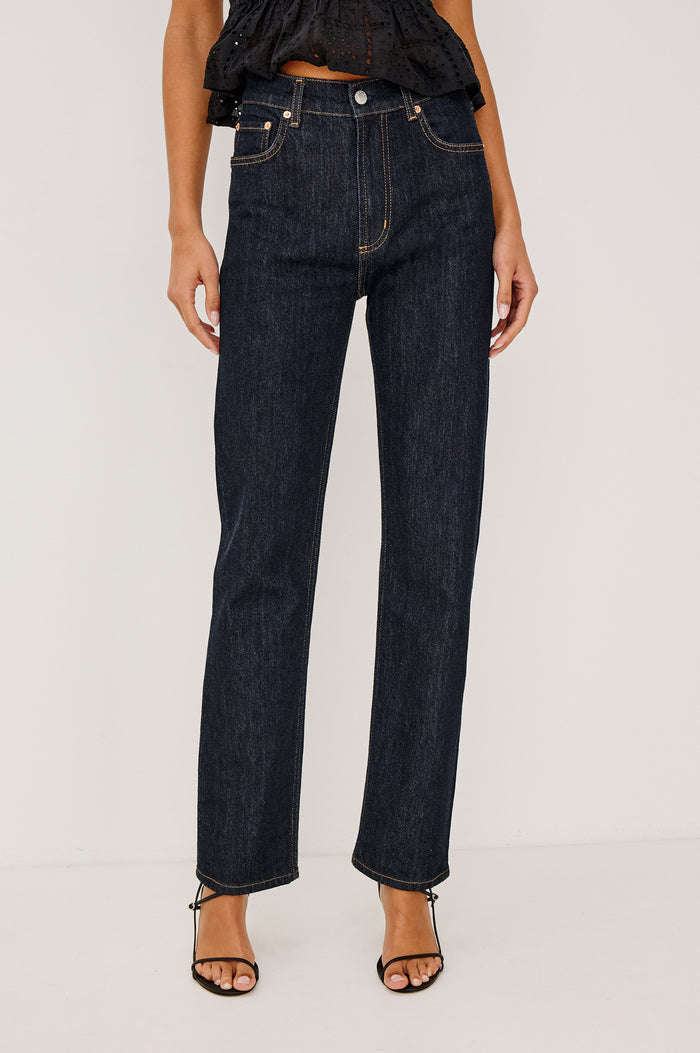 Topanga High-Rise Wide Straight Leg Jean in Dark Wash Denim With 5-Pockets and a Front Zip-Fly in Midnight Blues Colorway - Lower Body Front View Featured on Model