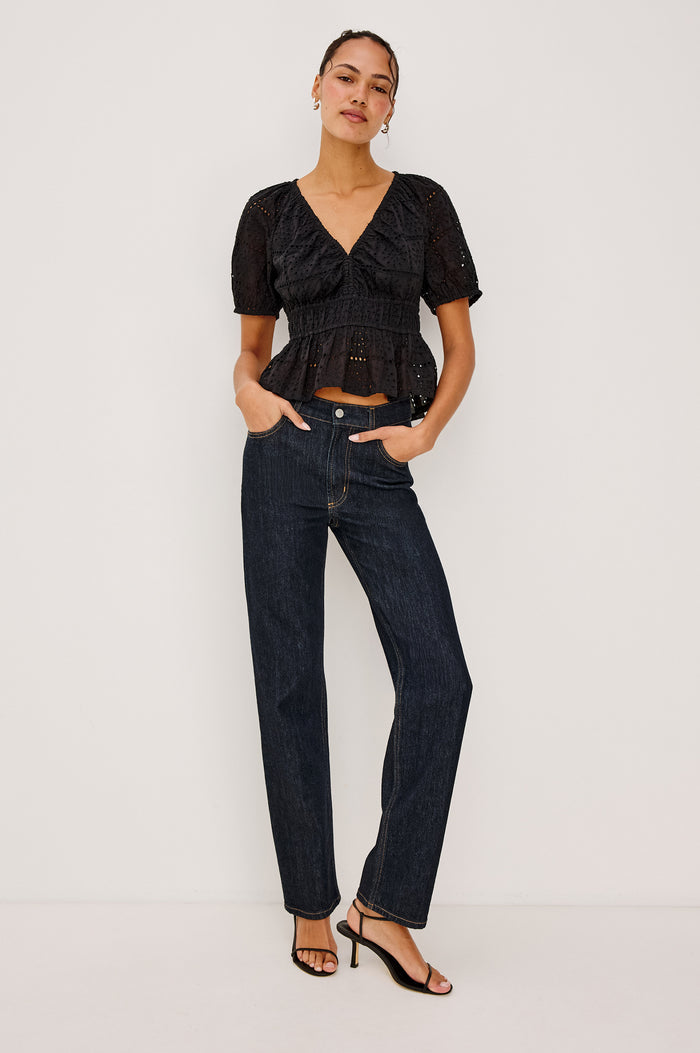 Topanga High-Rise Wide Straight Leg Jean in Dark Wash Denim With 5-Pockets and a Front Zip-Fly in Midnight Blues Colorway - Front View Featured on Model